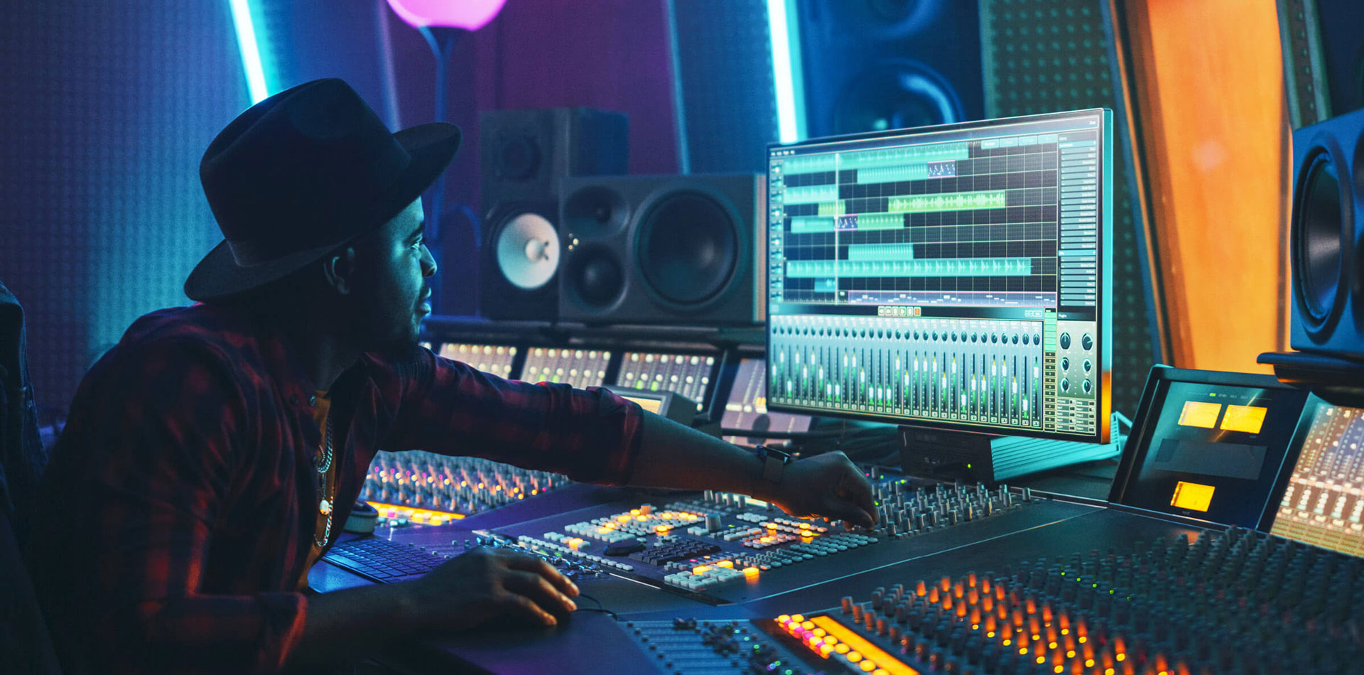 Male Regent student using sound production board